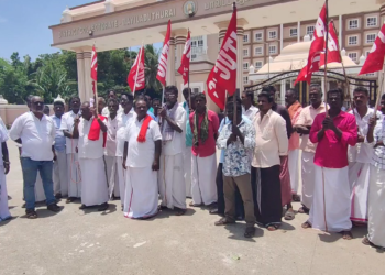 எடமணல் நுகர்பொருள் வாணிகழக கிடங்கில் சுமை பணி கைவிடக்கோரி தொழிலாளர்கள் ஆர்ப்பாட்டம்