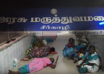 சீர்காழி அரசு மருத்துவமனையில் படுக்கை வசதி இல்லாமல்  நோயாளிகள் தரையில் படுத்து உறங்கும் அவலம்