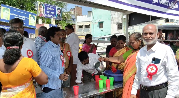 உலக ரெட் கிராஸ் தினத்தை முன்னிட்டு தேனியில் இந்தியன் ரெட் கிராஸ் சொசைட்டி சார்பில் நீர் மோர் பந்தல்