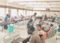 திருவாரூர் டாஸ்மார்க் அலுவலகம் முன்பு காலி மதுபாட்டில்கள் திரும்ப வாங்கும் திட்டத்தை கைவிட வலியுறுத்தி போராட்டம்